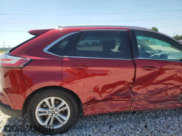 2019 Ford Edge SEL z VIN 2FMPK3J9XKBC35655, wystawiony jako Copart lot #52119085 z przebiegiem 22 395 mil mil oraz Szkoda całkowita • Salvage title. Historia ofert i sprzedaży dostępna na DreamBid. Obrazek 12.
