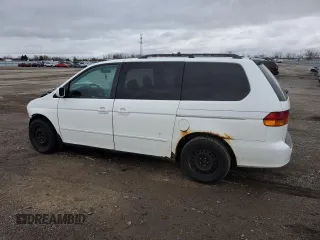 2002 Honda Odyssey EX z VIN 2HKRL18682H010276, wystawiony jako Copart lot #81397274 z przebiegiem Nie podano mil oraz Szkoda całkowita • Salvage title. Historia ofert i sprzedaży dostępna na DreamBid. Obrazek 2.