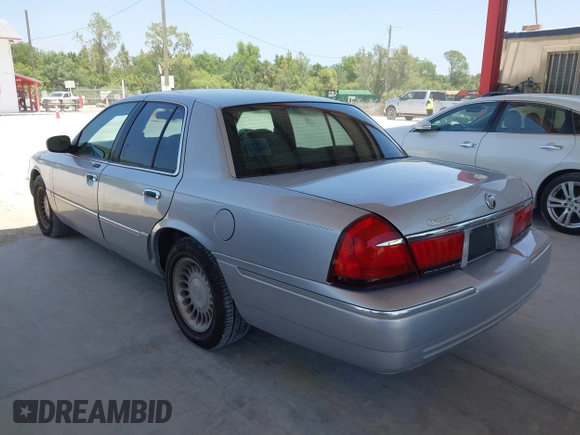 2001 Mercury Grand Marquis LS z VIN 2MEFM75W91X660964, wystawiony jako IAAI lot #42250931 z przebiegiem 74 462 mil mil oraz . Historia ofert i sprzedaży dostępna na DreamBid. Obrazek 3.