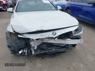 2018 BMW 4 Series 430i with VIN WBA4Z1C59JEC59501, listed as a IAAI auction lot 41588339 with 76,151 mi miles and . Bid and sale history available at carsss.com. Image 6.