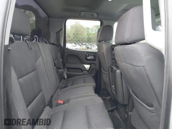 2018 Chevrolet Silverado 1500 LT with VIN 1GCVKREC7JZ151678, listed as a IAAI auction lot 41972011 with 106,892 mi miles and . Bid and sale history available at DreamBid. Image 8.
