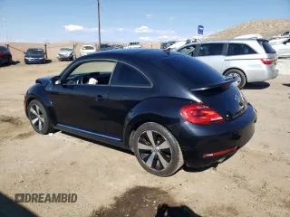 2014 Volkswagen Beetle Turbo R-Line with VIN 3VWVT7AT4EM606319, listed as a Copart auction lot 70489824 with Not Provided miles and Salvage Title. Bid and sale history available at DreamBid. Image 2.