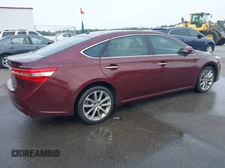 2014 Toyota Avalon Limited with VIN 4T1BK1EB3EU113035, listed as a IAAI auction lot 42040239 with 118,609 mi miles. Bid and sale history available at carsss.com. Image 4.