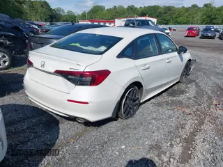 2023 Honda Civic Sport with VIN 2HGFE2F54PH512362, listed as a IAAI auction lot 41401479 with 12,672 mi miles and . Bid and sale history available at DreamBid. Image 4.