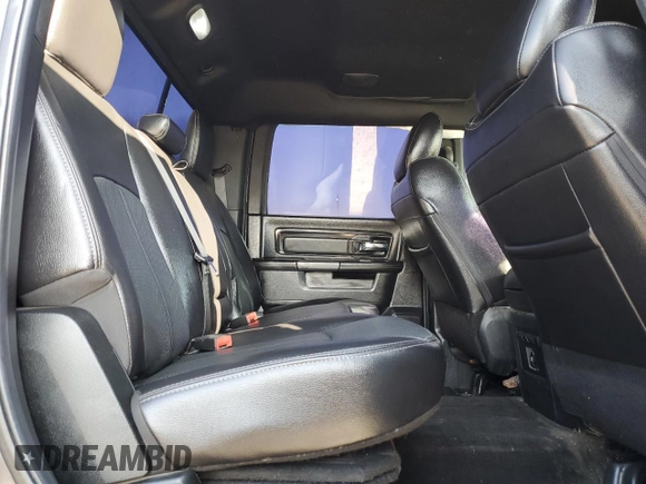 2018 Ram 1500 Rebel z VIN 1C6RR7YT1JS161619, wystawiony jako Copart lot #58272215 z przebiegiem 49 567 mil mil oraz Szkoda całkowita • Salvage title. Historia ofert i sprzedaży dostępna na DreamBid. Obrazek 10.
