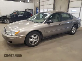 2005 Ford Taurus SE with VIN 1FAFP53U15A276082, listed as a Copart auction lot 52015285 with 103,479 mi miles and Salvage Title. Bid and sale history available at carsss.com. Image 1.