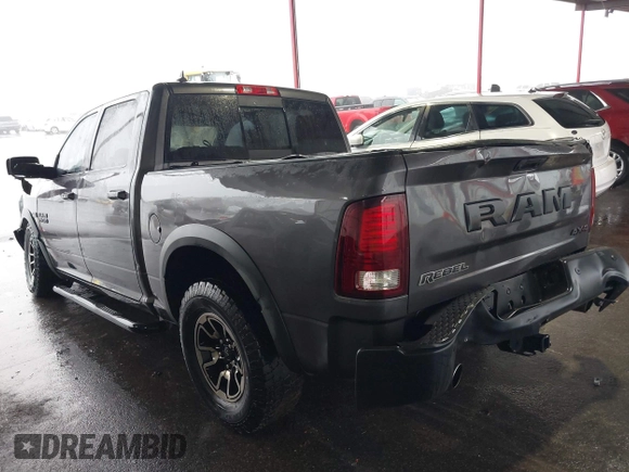 2017 Ram 1500 Rebel z VIN 1C6RR7YT0HS593919, wystawiony jako IAAI lot #41450337 z przebiegiem 164 024 mil mil oraz . Historia ofert i sprzedaży dostępna na DreamBid. Obrazek 3.