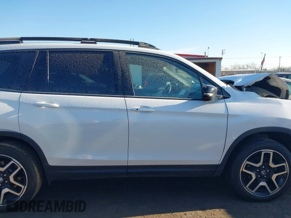 2023 Honda Passport Elite with VIN 5FNYF8H05PB005081, listed as a IAAI auction lot 41698186 with 31,853 mi miles and . Bid and sale history available at DreamBid. Image 13.