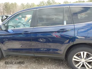 2018 Honda Pilot EX-L with VIN 5FNYF5H5XJB025960, listed as a IAAI auction lot 41843520 with 23,404 mi miles and . Bid and sale history available at DreamBid. Image 14.
