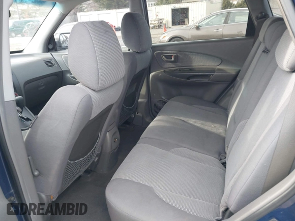 2007 Hyundai Tucson GLS with VIN KM8JM12B77U617990, listed as a IAAI auction lot 41300579 with 167,789 mi miles. Bid and sale history available at carsss.com. Image 8.