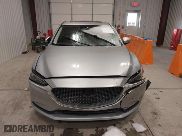 2018 Mazda 6 Touring with VIN JM1GL1VM8J1312778, listed as a IAAI auction lot 41387098 with 129,611 mi miles and . Bid and sale history available at carsss.com. Image 12.