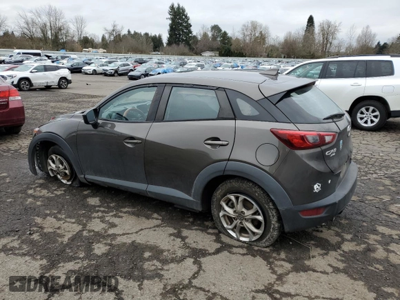 2018 Mazda CX-3 Sport z VIN JM1DKFB77J0312732, wystawiony jako Copart lot #45720065 z przebiegiem 99 866 mil mil oraz Szkoda całkowita • Salvage title. Historia ofert i sprzedaży dostępna na DreamBid. Obrazek 2.