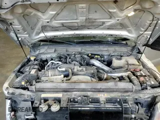 2015 Ford F-250 XLT z VIN 1FT7X2BT3FEB39323, wystawiony jako Copart lot #81321894 z przebiegiem 116 909 mil mil oraz Szkoda całkowita • Salvage title. Historia ofert i sprzedaży dostępna na DreamBid. Obrazek 13.