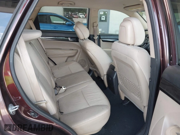 2012 Kia Sorento LX z VIN 5XYKT4A6XCG218424, wystawiony jako IAAI lot #42351646 z przebiegiem 185 016 mil mil oraz . Historia ofert i sprzedaży dostępna na DreamBid. Obrazek 8.