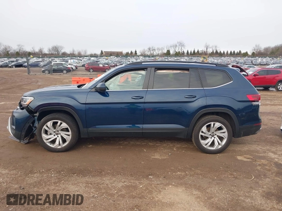 2023 Volkswagen Atlas SE z VIN 1V2KR2CA8PC504298, wystawiony jako IAAI lot #41234957 z przebiegiem 34 762 mil mil oraz . Historia ofert i sprzedaży dostępna na DreamBid. Obrazek 14.