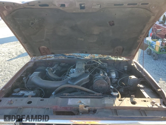 1988 Ford Bronco z VIN 1FMCU14T3JUD16266, wystawiony jako Copart lot #77365034 z przebiegiem 81 445 mil mil oraz Szkoda całkowita • Salvage title. Historia ofert i sprzedaży dostępna na DreamBid. Obrazek 11.