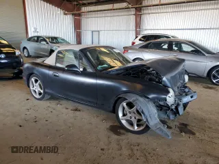 2003 Mazda MX-5 Miata Cloth with VIN JM1NB353730303334, listed as a Copart auction lot 51692615 with 142,789 mi miles and Salvage title. Bid and sale history available at DreamBid. Image 4.