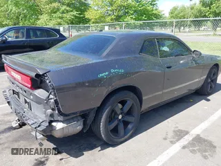 2013 Dodge Challenger R/T z VIN 2C3CDYBT6DH611180, wystawiony jako IAAI lot #42188218 z przebiegiem 101 023 mil mil oraz . Historia ofert i sprzedaży dostępna na DreamBid. Obrazek 4.