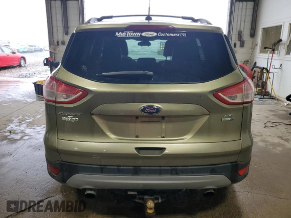 2013 Ford Escape SE z VIN 1FMCU9GX0DUA43966, wystawiony jako Copart lot #66152725 z przebiegiem 122 498 mil mil oraz Czysty tytuł • Clean title. Historia ofert i sprzedaży dostępna na DreamBid. Obrazek 6.