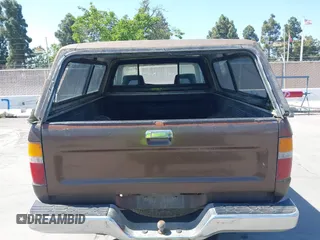 1989 Toyota Pickup DX with VIN JT4RN01PXK7010307, listed as a IAAI auction lot 42212229 with 389,623 mi miles and . Bid and sale history available at DreamBid. Image 8.