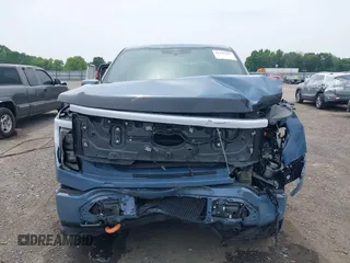 2023 Ford F-150 Lightning Pro with VIN 1FT6W1EVXPWG53591, listed as a IAAI auction lot 42249385 with 17,892 mi miles and . Bid and sale history available at DreamBid. Image 12.