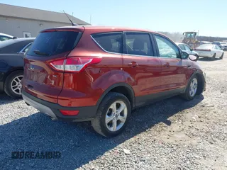 2015 Ford Escape SE with VIN 1FMCU0G71FUC87446, listed as a IAAI auction lot 41814589 with 137,051 mi miles. Bid and sale history available at carsss.com. Image 4.