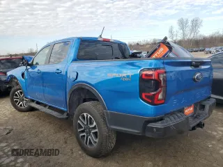 2024 Ford Ranger LARIAT with VIN 1FTER4KP0RLE53608, listed as a Copart auction lot 44106475 with 1,169 mi miles and Salvage Title. Bid and sale history available at carsss.com. Image 2.