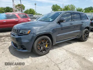 2018 Jeep Grand Cherokee Trackhawk with VIN 1C4RJFN99JC309254, listed as a Copart auction lot 64061615 with 104,558 mi miles and Clean title. Bid and sale history available at DreamBid. Image 1.