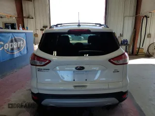 2013 Ford Escape SE with VIN 1FMCU9GX8DUB59593, listed as a Copart auction lot 64526535 with 146,020 mi miles and Salvage title. Bid and sale history available at DreamBid. Image 6.