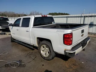 2018 Chevrolet Silverado 1500 LT with VIN 3GCUKREC0JG596842, listed as a Copart auction lot 47394105 with 135,583 mi miles and Salvage Title. Bid and sale history available at carsss.com. Image 2.