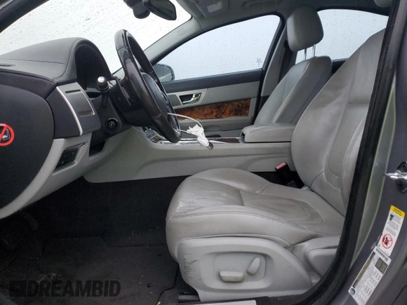 2013 Jaguar XF V6 SC with VIN SAJWJ0EF5D8S76767, listed as a Copart auction lot 80329174 with 100,519 mi miles and Salvage Title. Bid and sale history available at carsss.com. Image 7.