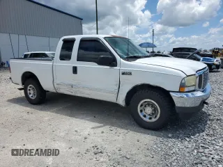 2003 Ford F-250 XL with VIN 1FTNX20L63EB37975, listed as a Copart auction lot 65723935 with 157,377 mi miles and Salvage title. Bid and sale history available at DreamBid. Image 4.