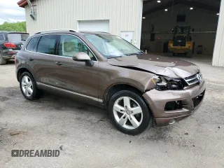 2013 Volkswagen Touareg Exec с VIN WVGEF9BP4DD007109, выставлен на аукционе Copart как лот 58890665 с пробегом 157 286 миль миль и Списание • Salvage title. История ставок и продаж доступна на DreamBid. Изображение 4.