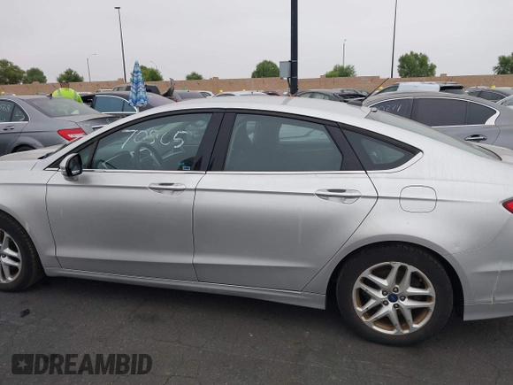 2016 Ford Fusion SE z VIN 3FA6P0H73GR144942, wystawiony jako IAAI lot #42770565 z przebiegiem 42 986 mil mil oraz . Historia ofert i sprzedaży dostępna na DreamBid. Obrazek 14.