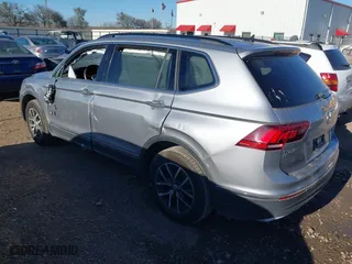 2020 Volkswagen Tiguan SE with VIN 3VV2B7AX4LM081188, listed as a IAAI auction lot 41655478 with 63,593 mi miles. Bid and sale history available at carsss.com. Image 3.