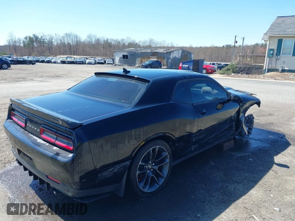 2022 Dodge Challenger R/T Scat Pack z VIN 2C3CDZFJ4NH256848, wystawiony jako IAAI lot #41850081 z przebiegiem 23 537 mil mil oraz . Historia ofert i sprzedaży dostępna na DreamBid. Obrazek 4.