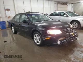 2000 Nissan Maxima GXE z VIN JN1CA31A1YT211725, wystawiony jako Copart lot #47401895 z przebiegiem 122 228 mil mil oraz Szkody całkowita. Historia ofert i sprzedaży dostępna na DreamBid. Obrazek 4.