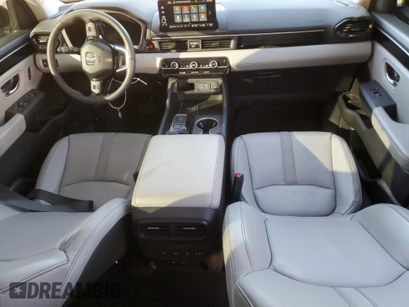 2024 Honda Pilot Touring z VIN 5FNYG2H76RB006511, wystawiony jako Copart lot #80920634 z przebiegiem 19 333 mil mil oraz Szkoda całkowita • Salvage title. Historia ofert i sprzedaży dostępna na DreamBid. Obrazek 8.