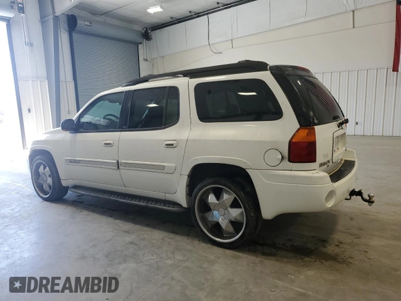 2003 GMC Envoy SLT with VIN 1GKES16S436240107, listed as a Copart auction lot 52327005 with 237,745 mi miles and Clean Title. Bid and sale history available at carsss.com. Image 2.