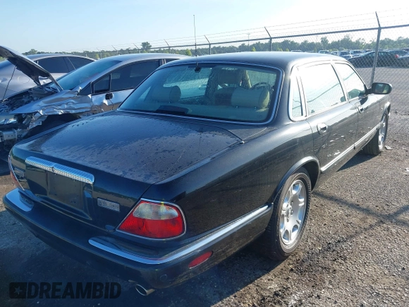 2001 Jaguar XJ Vanden Plas with VIN SAJDA24C81LF23026, listed as a IAAI auction lot 42671098 with 83,759 mi miles and . Bid and sale history available at DreamBid. Image 4.