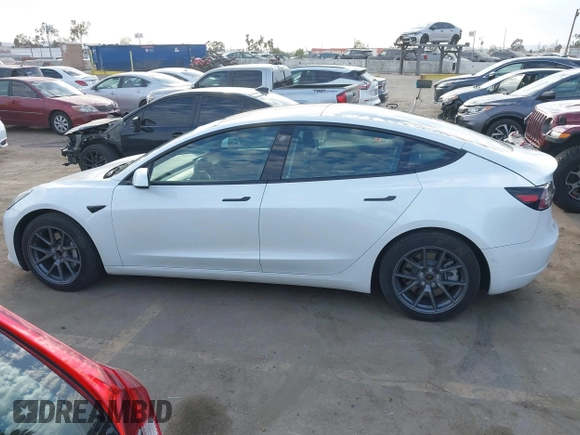 2022 Tesla Model 3 with VIN 5YJ3E1EA8NF210196, listed as a IAAI auction lot 41674407 with 24,270 mi miles. Bid and sale history available at carsss.com. Image 14.