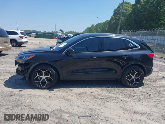 2021 Ford Escape SE z VIN 1FMCU0G66MUB26983, wystawiony jako IAAI lot #42144053 z przebiegiem 60 614 mil mil oraz . Historia ofert i sprzedaży dostępna na DreamBid. Obrazek 15.