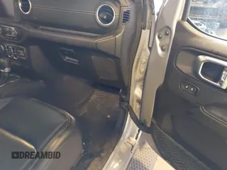 2021 Jeep Gladiator High Altitude with VIN 1C6HJTFG1ML556741, listed as a IAAI auction lot 42240680 with 47,926 mi miles and . Bid and sale history available at DreamBid. Image 5.