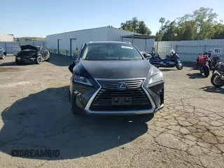 2019 Lexus RX 450h with VIN 2T2BGMCA4KC036097, listed as a Copart auction lot 61475175 with 63,811 mi miles and Salvage title. Bid and sale history available at DreamBid. Image 14.