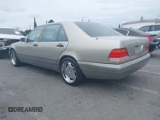 1996 Mercedes-Benz S with VIN WDBGA57E8TA318326, listed as a IAAI auction lot 42072979 with 97,504 mi miles and . Bid and sale history available at DreamBid. Image 3.