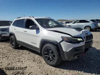 2019 Jeep Cherokee Trailhawk with VIN 1C4PJMBX7KD336494, listed as a Copart auction lot 50346545 with 69,994 mi miles and Salvage Title. Bid and sale history available at DreamBid. Image 4.