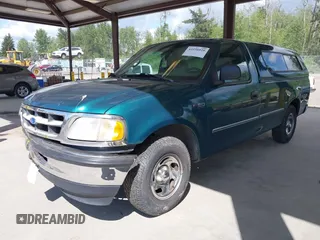 1997 Ford F-150 with VIN 1FTDF1727VKC49064, listed as a IAAI auction lot 42256020 with 197,494 mi miles and . Bid and sale history available at DreamBid. Image 2.