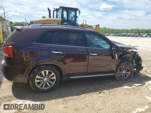 2012 Kia Sorento SX z VIN 5XYKWDA29CG301363, wystawiony jako Copart lot #55954815 z przebiegiem 83 206 mil mil oraz Szkoda całkowita • Salvage title. Historia ofert i sprzedaży dostępna na DreamBid. Obrazek 3.