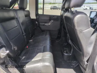 2012 Jeep Wrangler Unlimited Sahara z VIN 1C4HJWEG1CL168435, wystawiony jako Copart lot #58431615 z przebiegiem 120 364 mil mil oraz Szkoda całkowita • Salvage title. Historia ofert i sprzedaży dostępna na DreamBid. Obrazek 11.