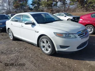 2014 Ford Taurus SEL with VIN 1FAHP2E88EG127074, listed as a IAAI auction lot 41688975 with 186,650 mi miles. Bid and sale history available at carsss.com. Image 1.